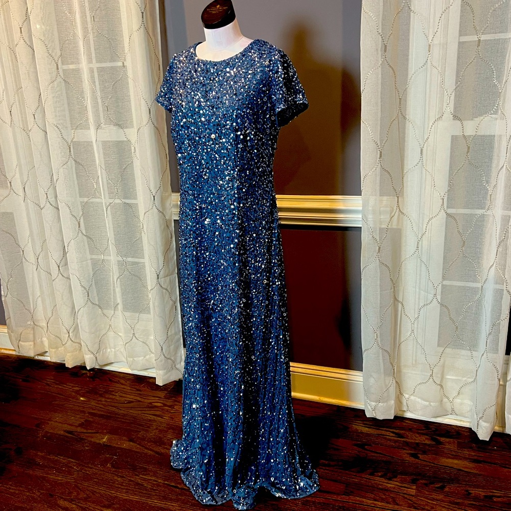 Stunning blue bird shade of blue maxi gown w/ a modest cut and lots of sparkle!